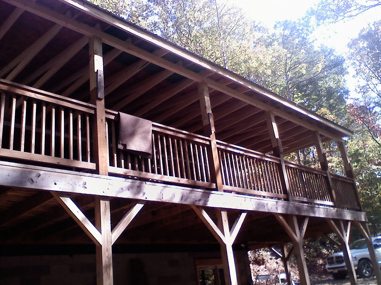 Timber framing under a new elevated porch and deck — Roof Leak Repair in Harvest by Roofing Brothers